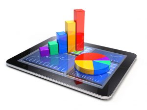 Bar graph and pie chart on tablet pc - Business statistic concept